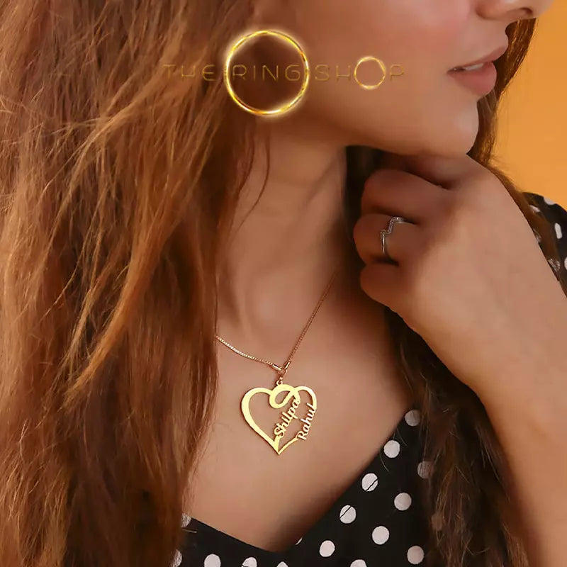 collier avec deux prénoms dans un coeur or